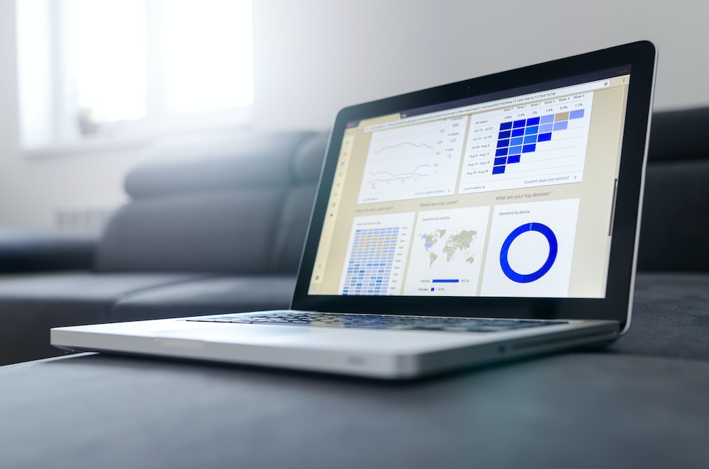 a laptop displaying research and data