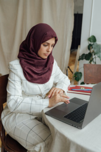 a woman working on her laptop